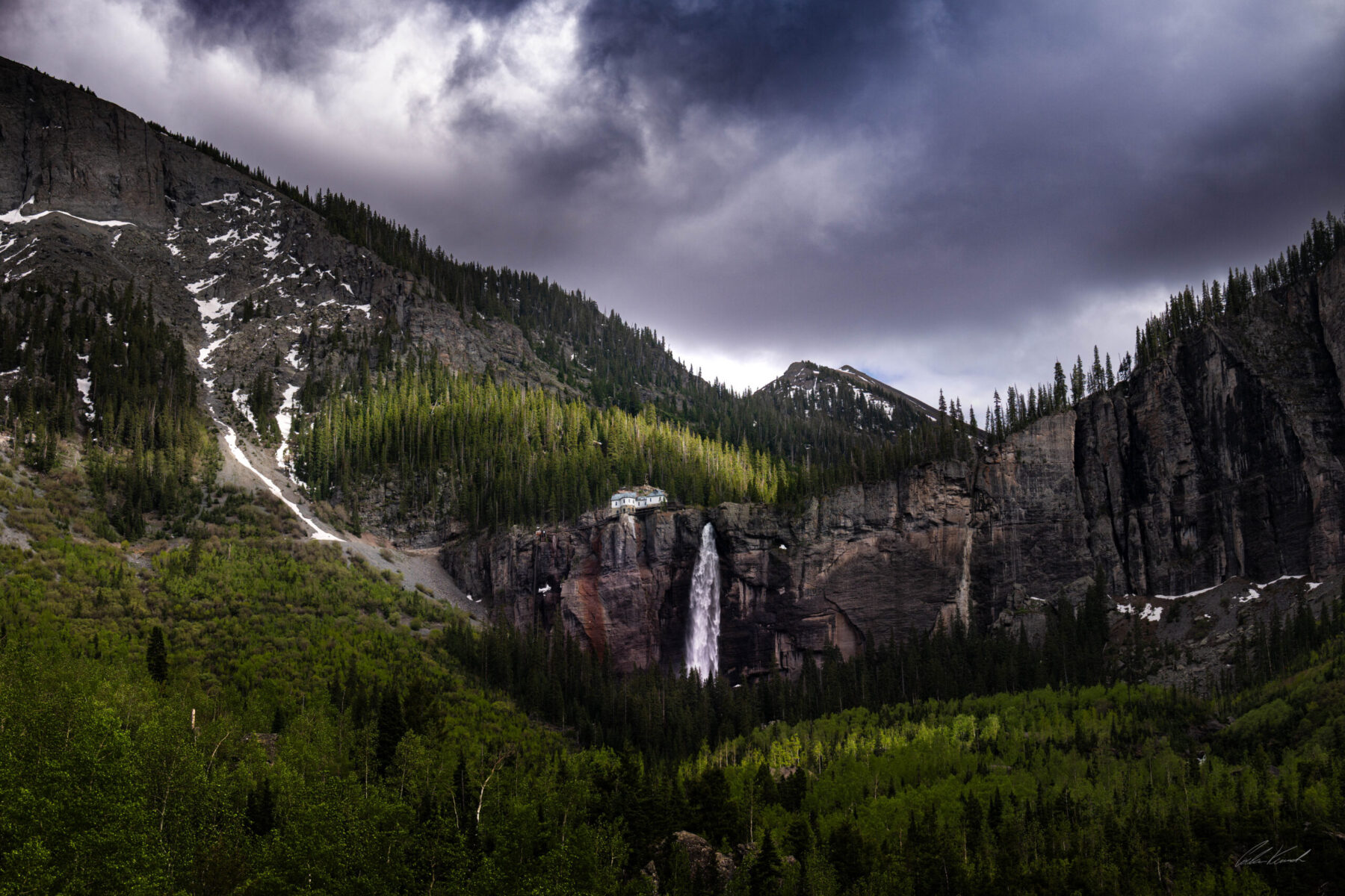 Waterfall beneath Colorado's San Juan Mountains