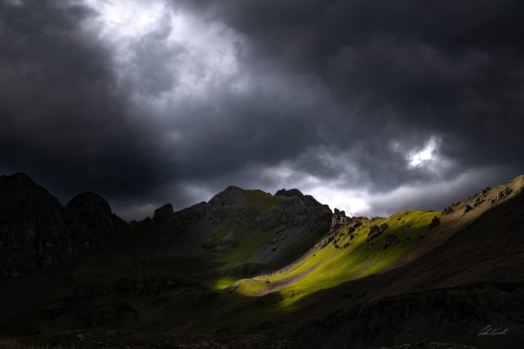 Storm clouds over a Colorado alpine valley