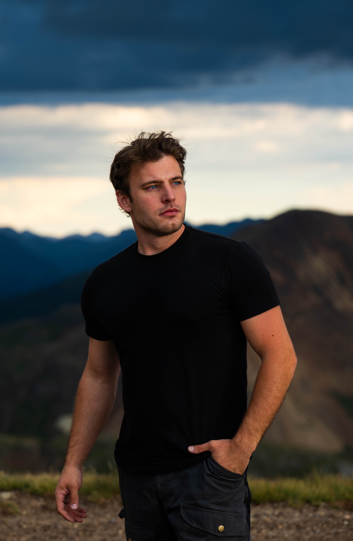 Corbin Kinsch in front of the Colorado mountains